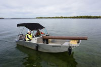 Lightweight RS PowerON composite poles being transported on a small boat