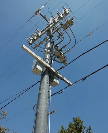 Vaccum recloser and bypass switches on the composite pole top shown, on a pole on the "Circuit of the Future"