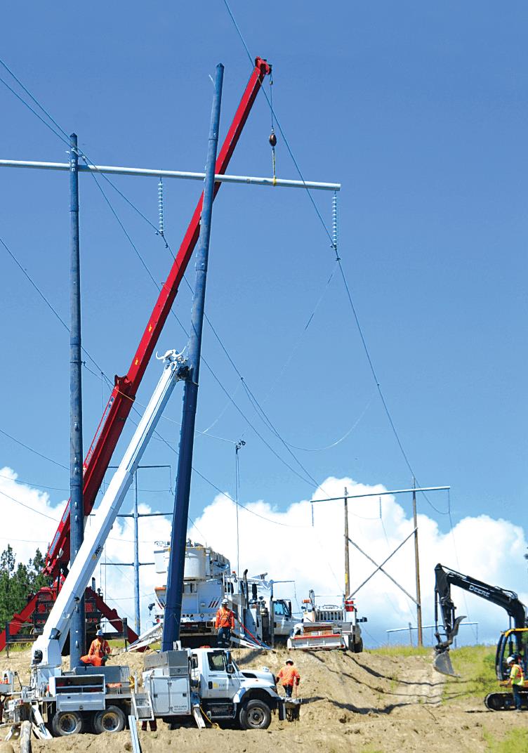 Composite poles being installed