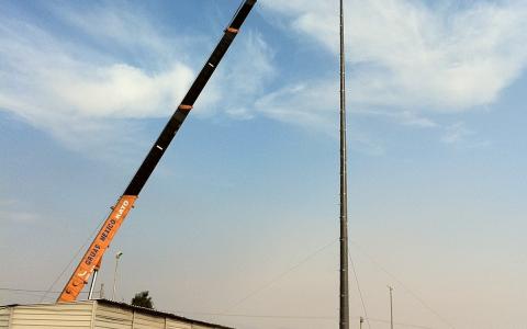 RS PowerON composite pole being installed in a communication application